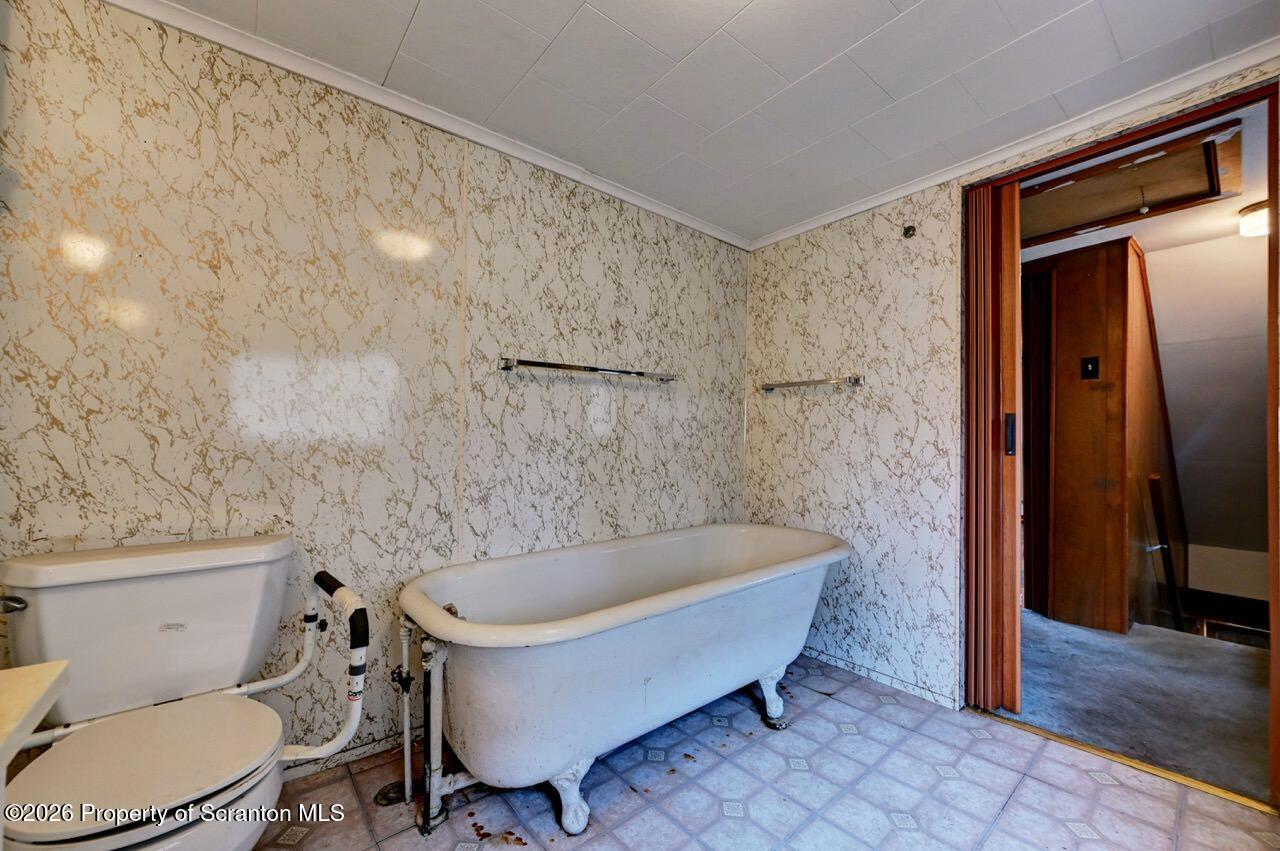 18 Green Ridge Street Scranton, PA 18509 - Photo 22 of 29 a bathroom with a toilet and a sink