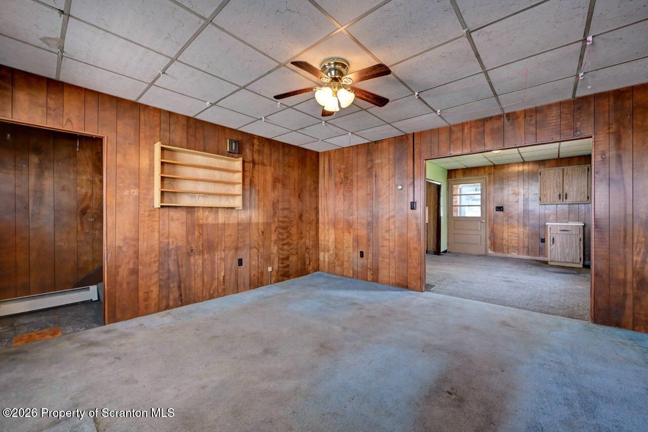 18 Green Ridge Street Scranton, PA 18509 - Photo 7 of 29 a view of a livingroom with a chandelier fan and windows