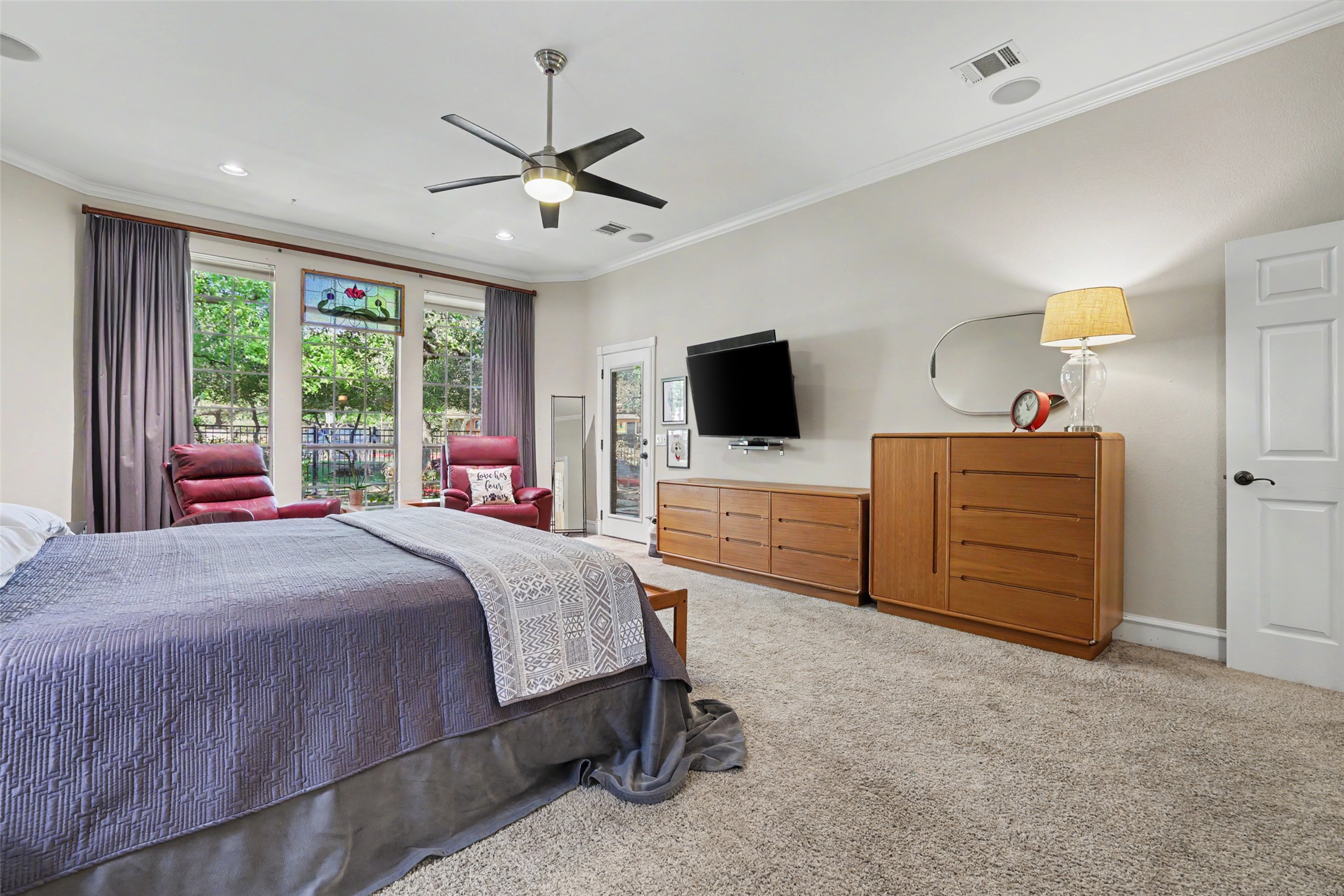 805 Boquilla Trail Georgetown, TX 78633 - Photo 20 of 40 a bedroom with a bed and a flat screen tv