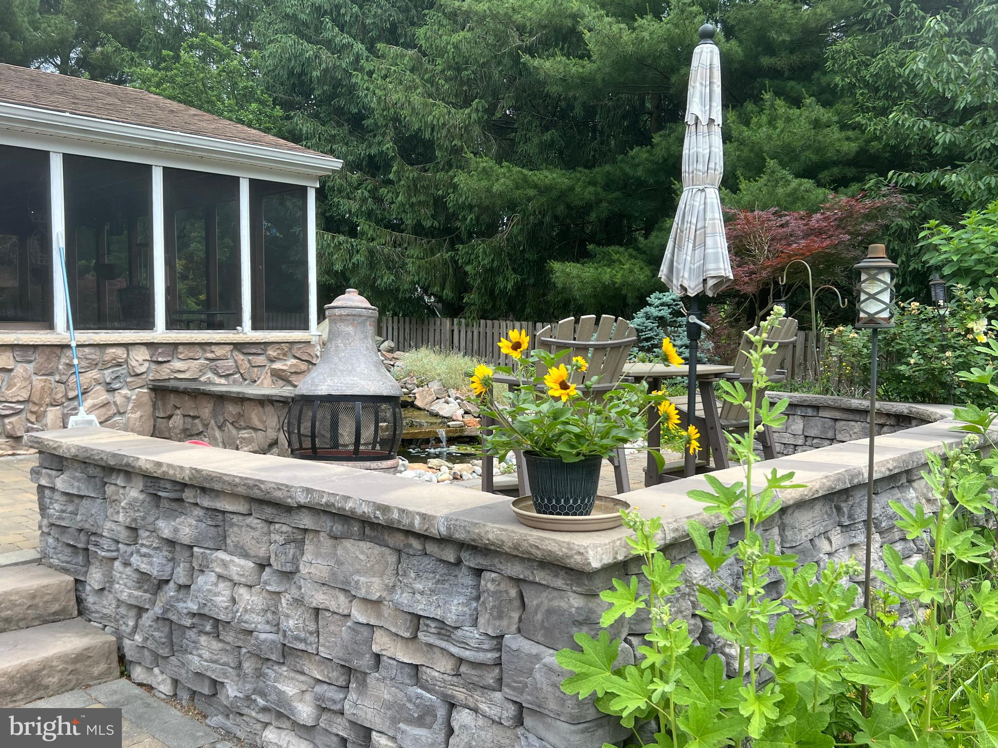 720 North Reeds Road Downingtown, PA 19335 - Photo 20 of 28 Well thought out hardscaped patio off of porch