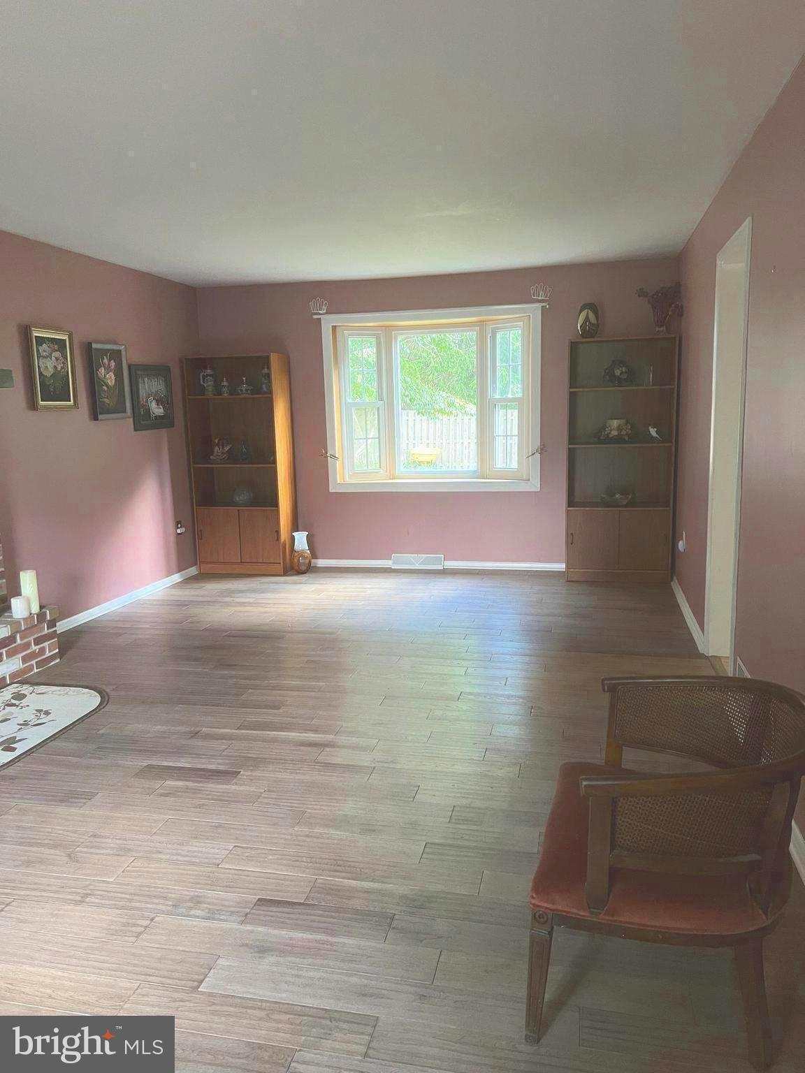 720 North Reeds Road Downingtown, PA 19335 - Photo 10 of 28 Front to Back Living Room with Bay Casement Window
