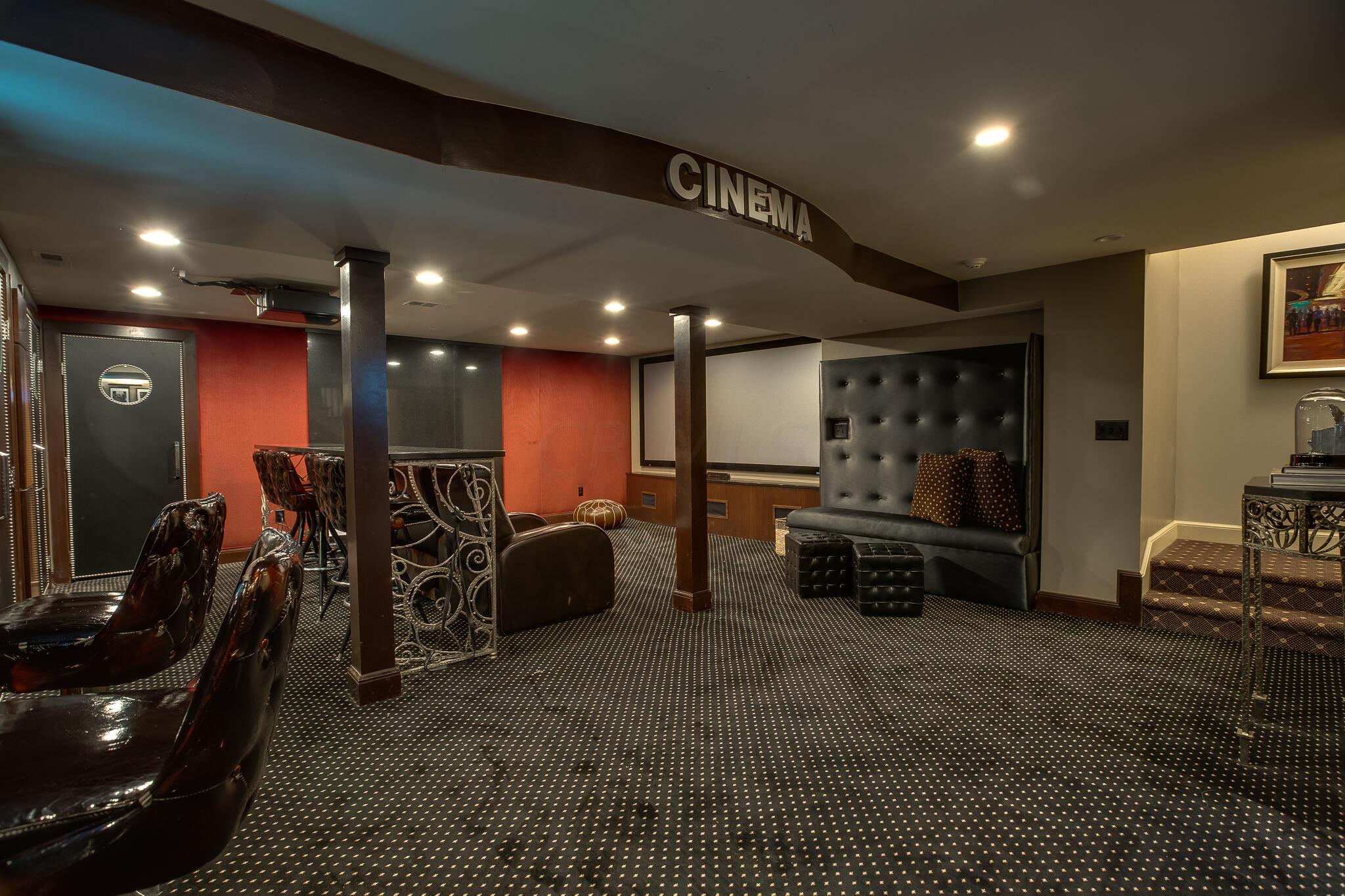 2252 Tremont Road Columbus, OH 43221 - Photo 68 of 97 Remodeled basement with stunning bar, sitting areas, and cinema seating with movie screen.