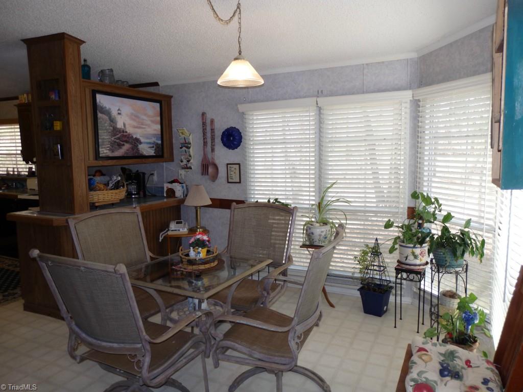 1744 Finch Farm Road Thomasville, NC 27360 - Photo 16 of 25 Sunroom/Breakfast nook