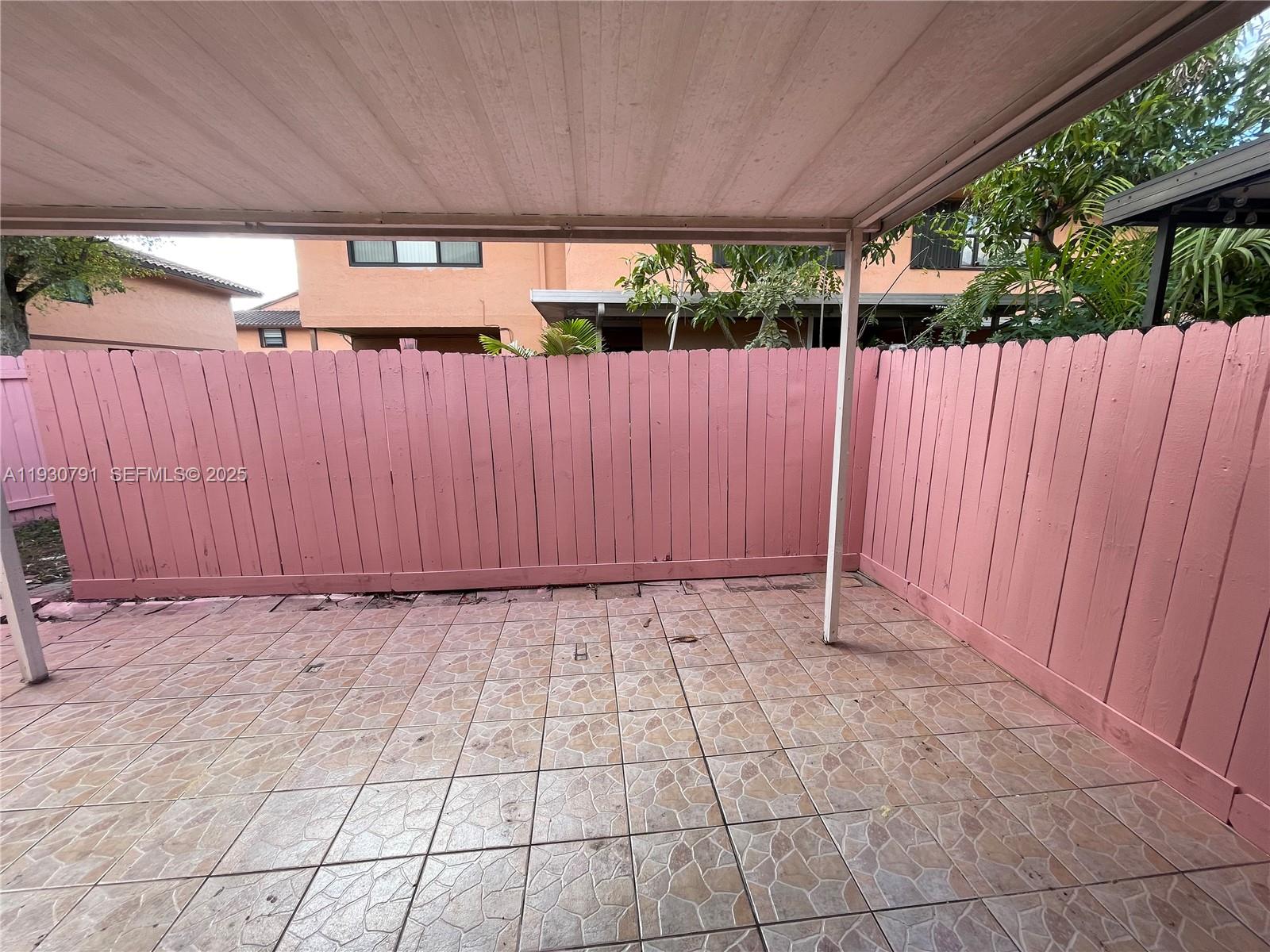 6450 West 27th Way, Unit 101 Hialeah, FL 33016 - Photo 11 of 11 a view of a utility room with wooden walls
