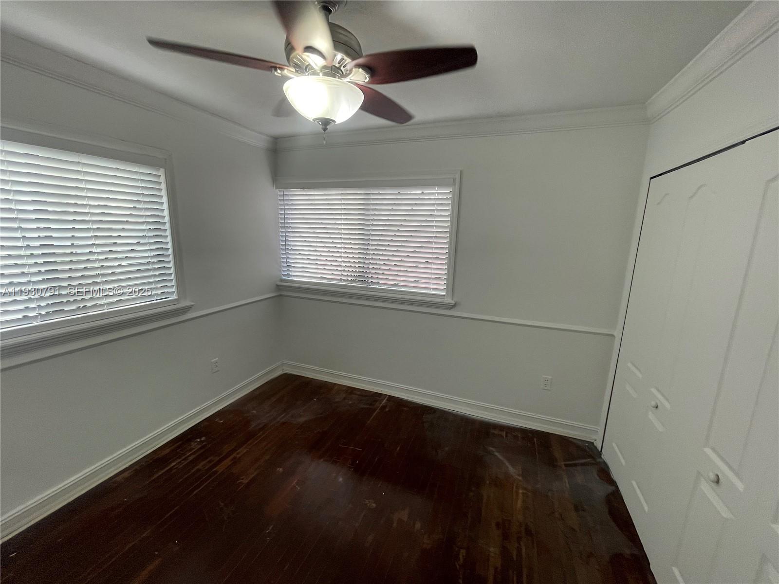 6450 West 27th Way, Unit 101 Hialeah, FL 33016 - Photo 3 of 11 a view of an empty room with a window