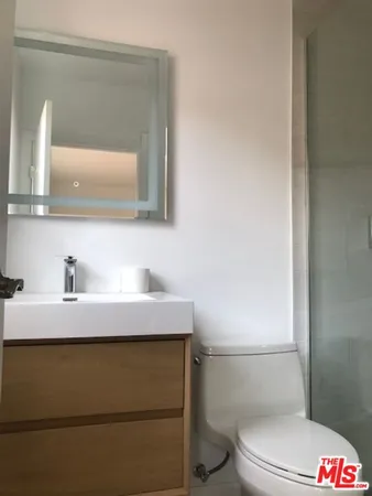 a bathroom with a sink and a toilet