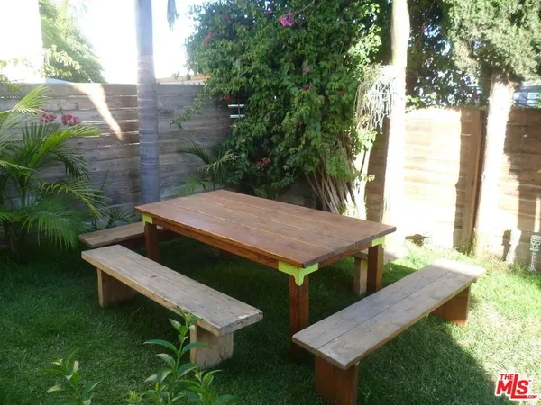 a view of a patio in backyard