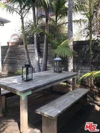 a backyard of a house with seating space