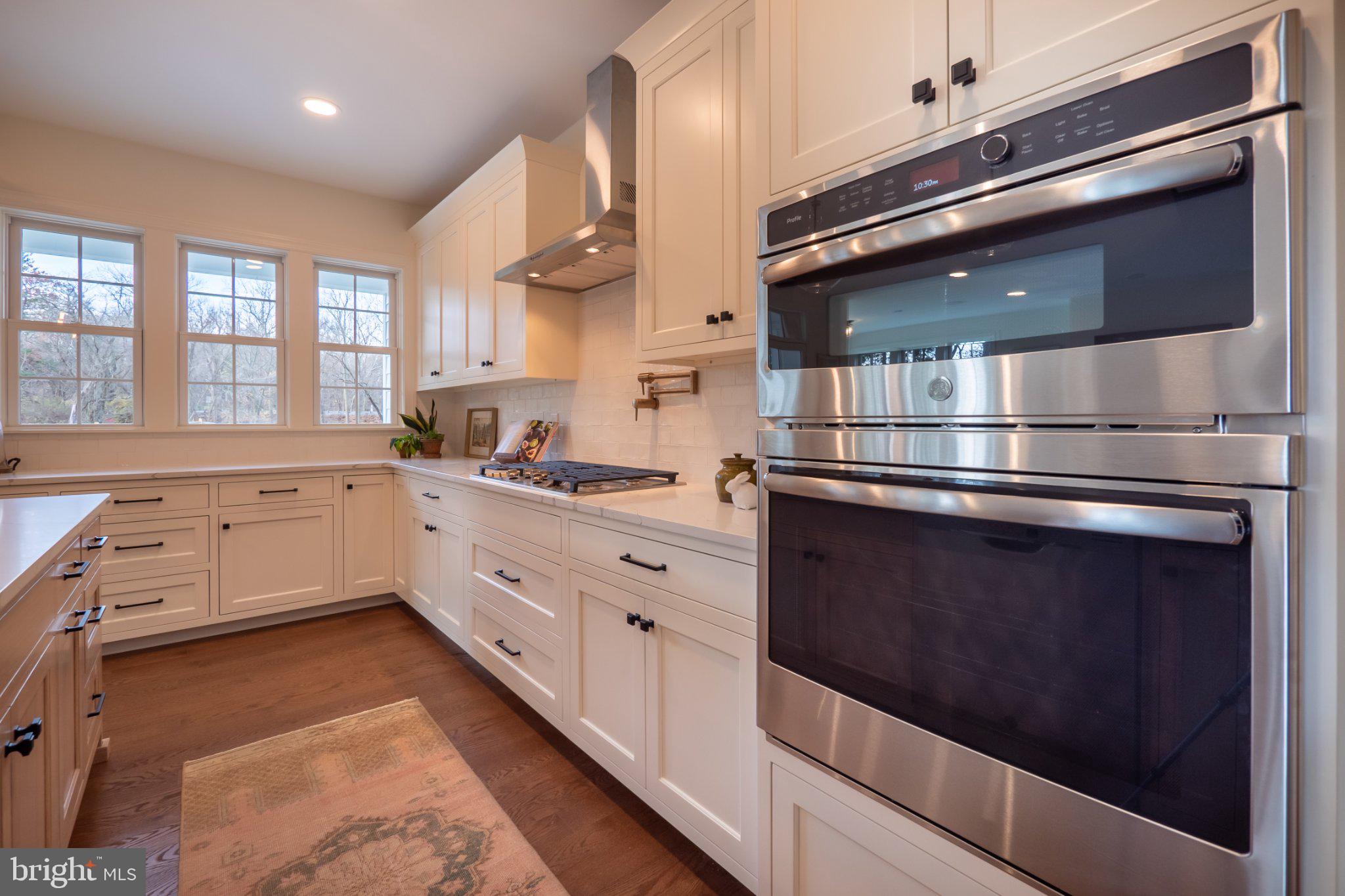 4630 Old Saucon Road Bethlehem, PA 18015 - Photo 10 of 33 a kitchen with stainless steel appliances cabinets and a window
