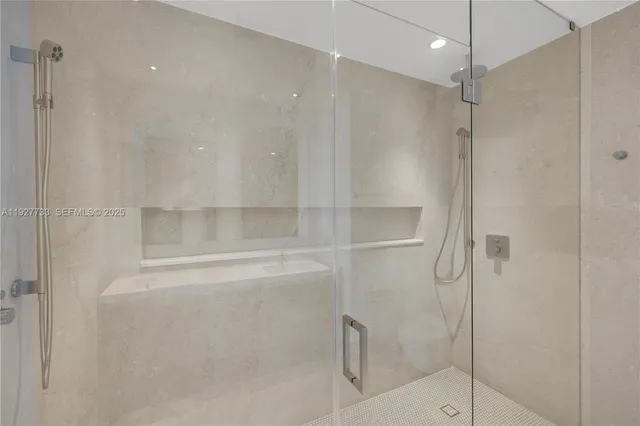 a view of an empty room with a large window