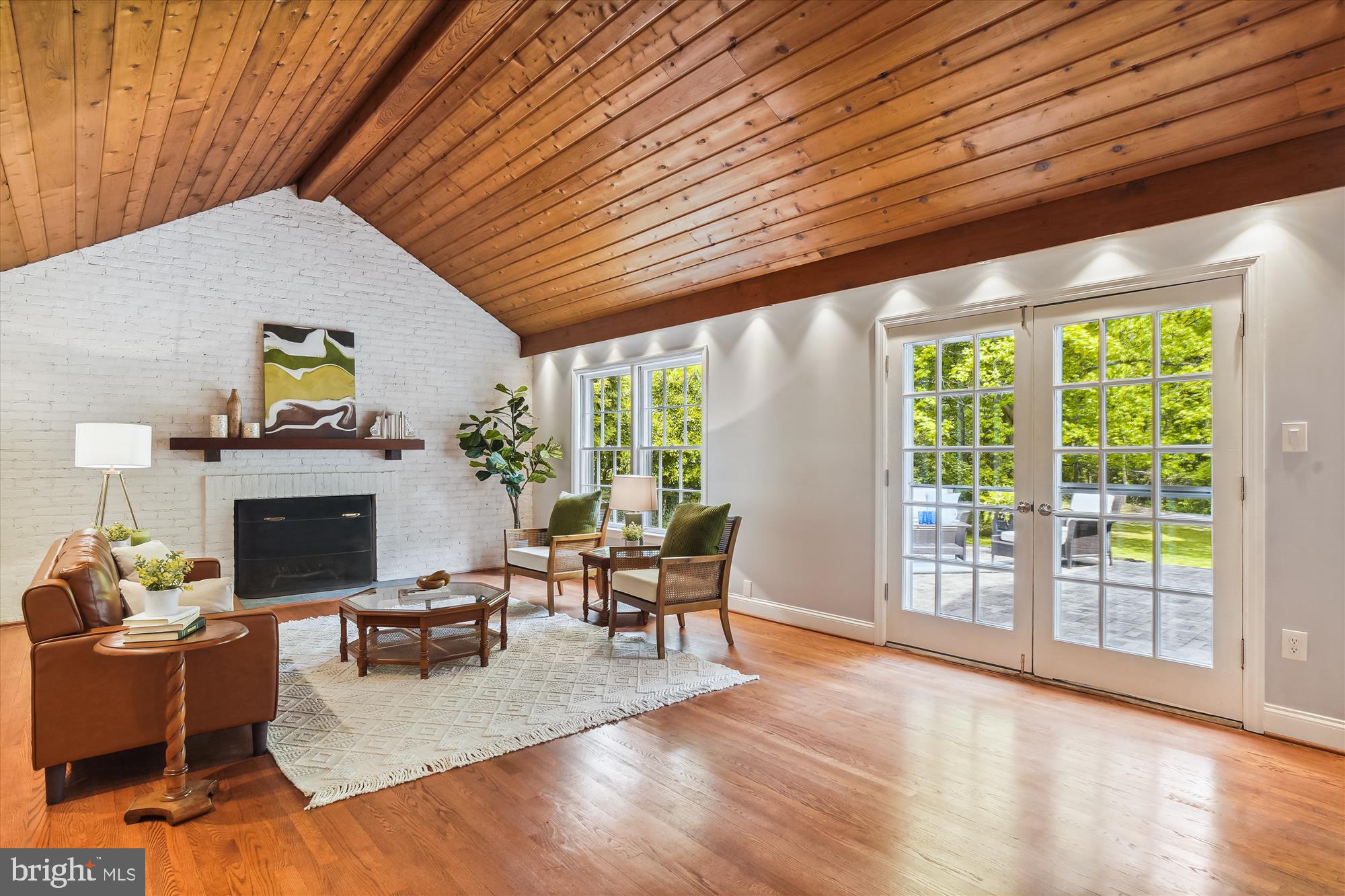 10001 Carter Road Bethesda, MD 20817 - Photo 18 of 78 Family Room with 2nd Fireplace & Exit to Patio