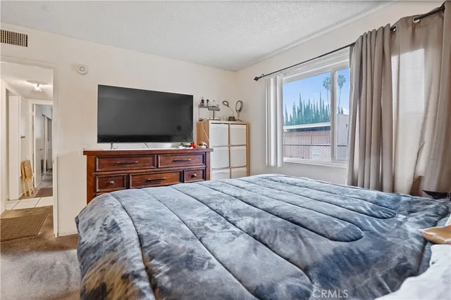 a bathroom with a sink toilet and mirror