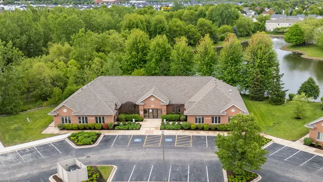 an aerial view of a house with garden