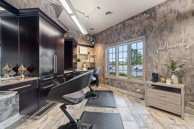 a room with gym equipment and window