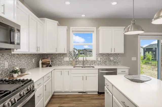 $550,000 | 9850 Glacial Valley Road, Woodbury, MN 55129