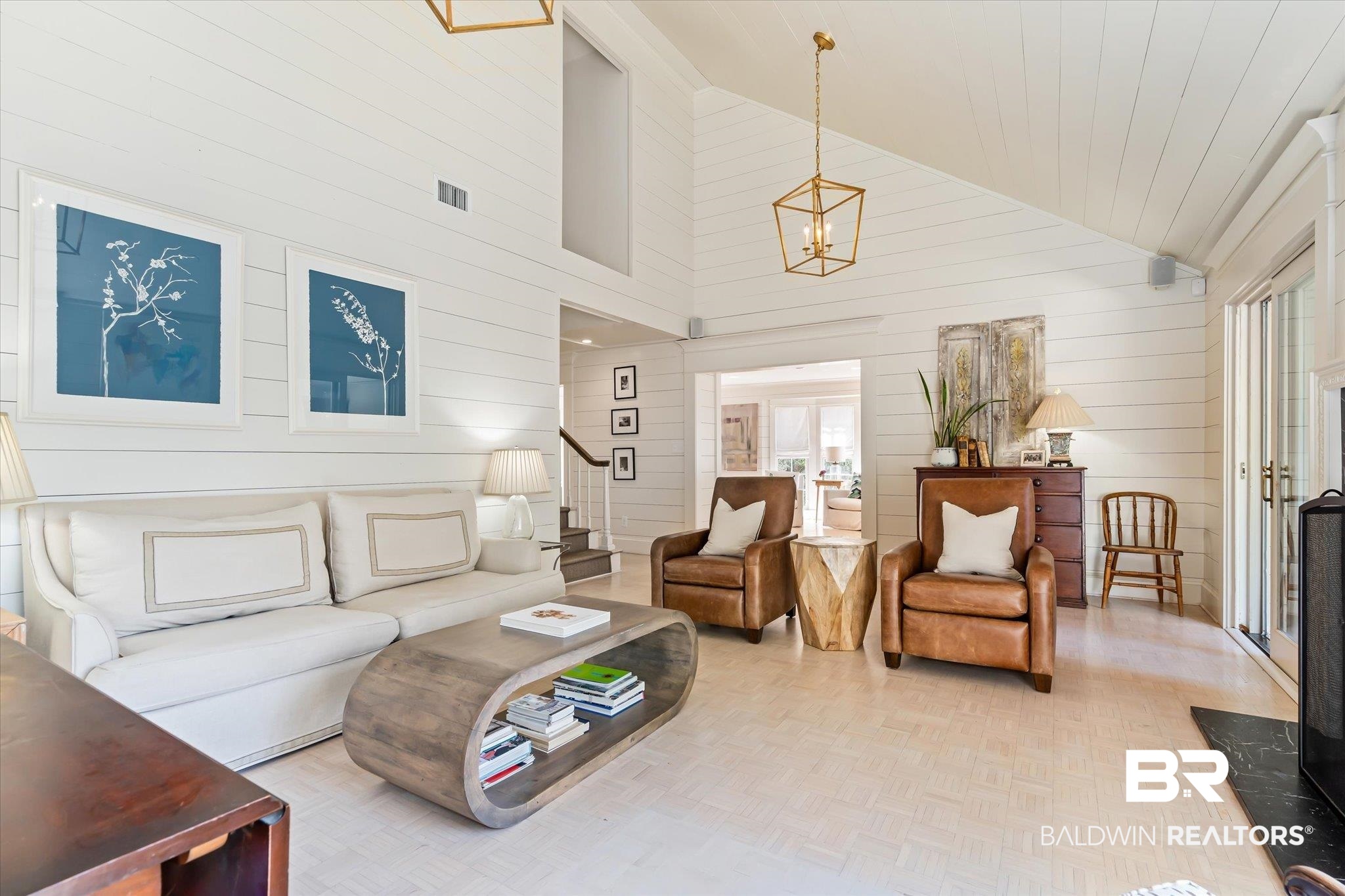 3921 McGregor Court Mobile, AL 36608 - Photo 14 of 41 Living room featuring stairway, visible vents, high vaulted ceiling, and a chandelier