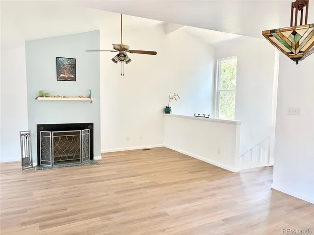 a view of a kitchen from the hallway