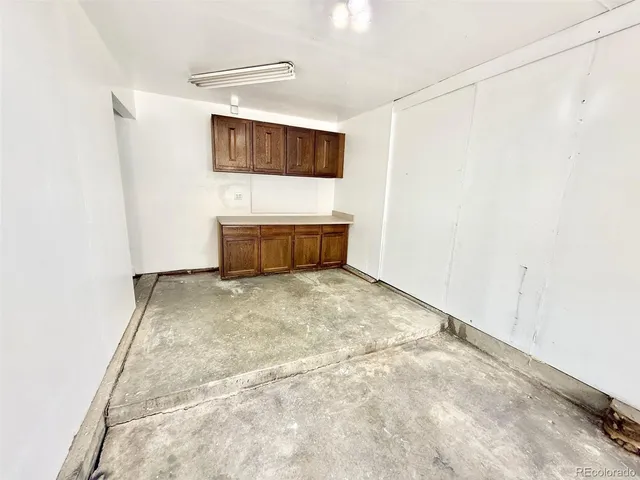 a view of a park with large trees