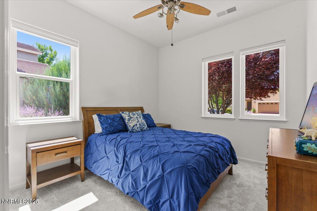 2515 Perryville Drive Reno, NV 89521 - Photo 13 of 19 a bedroom with a bed and a window