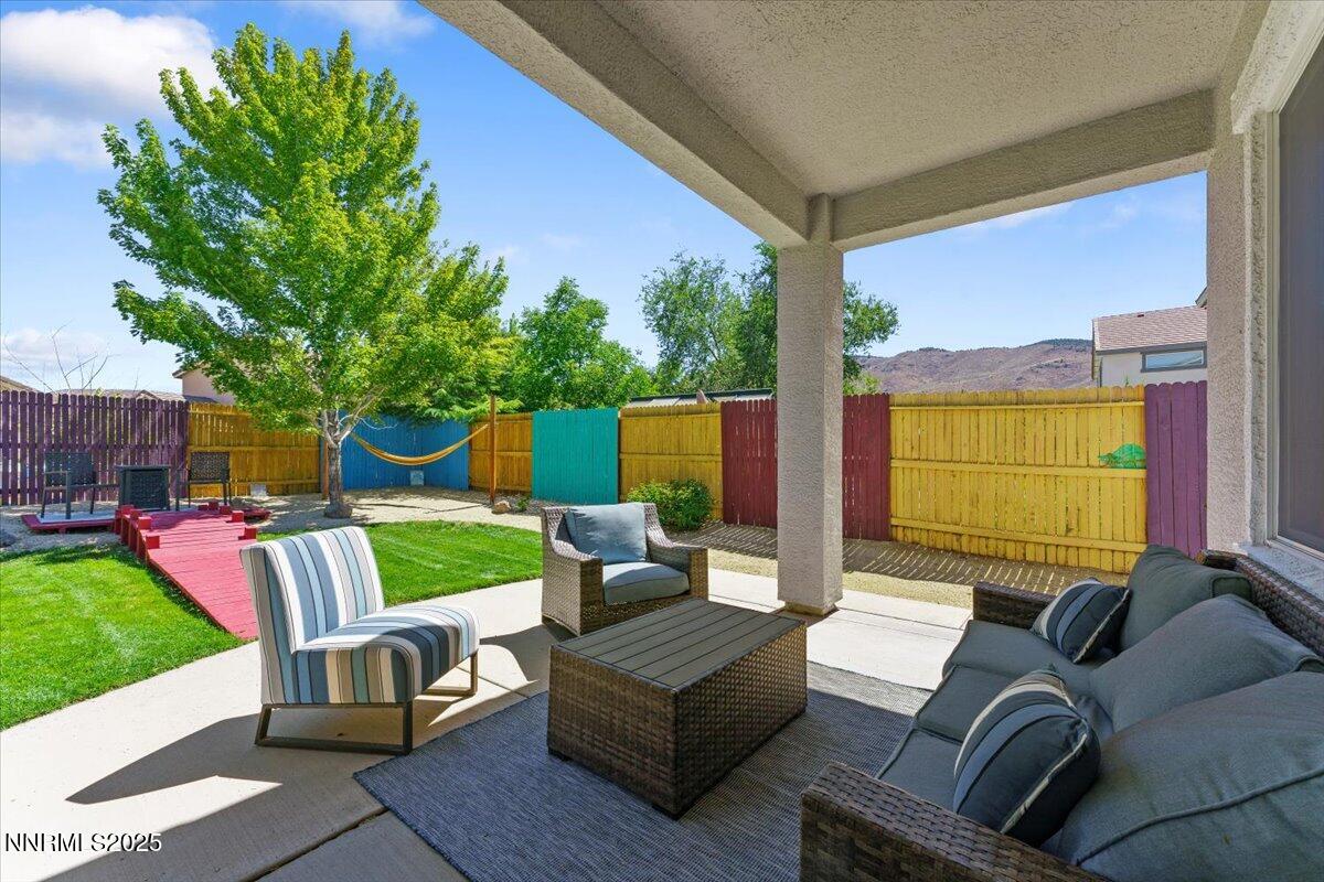 2515 Perryville Drive Reno, NV 89521 - Photo 14 of 19 a outdoor living space with furniture potted plant and a large window
