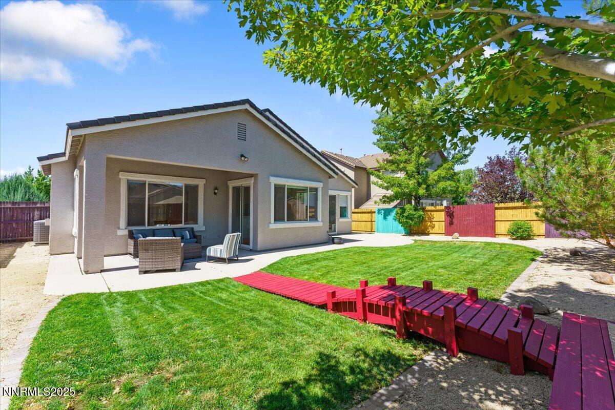 2515 Perryville Drive Reno, NV 89521 - Photo 16 of 19 a front view of a house with a yard and porch