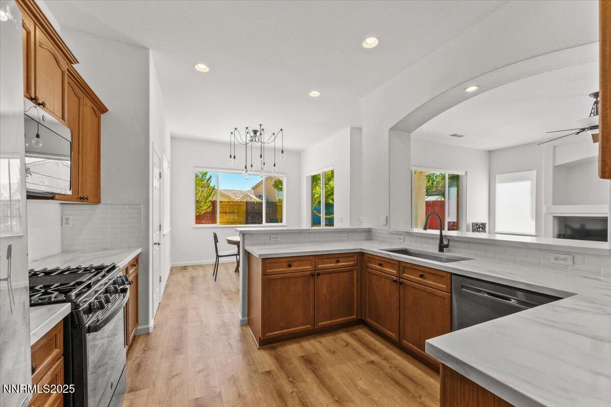 2515 Perryville Drive Reno, NV 89521 - Photo 6 of 19 a kitchen with lots of counter top space and stainless steel appliances
