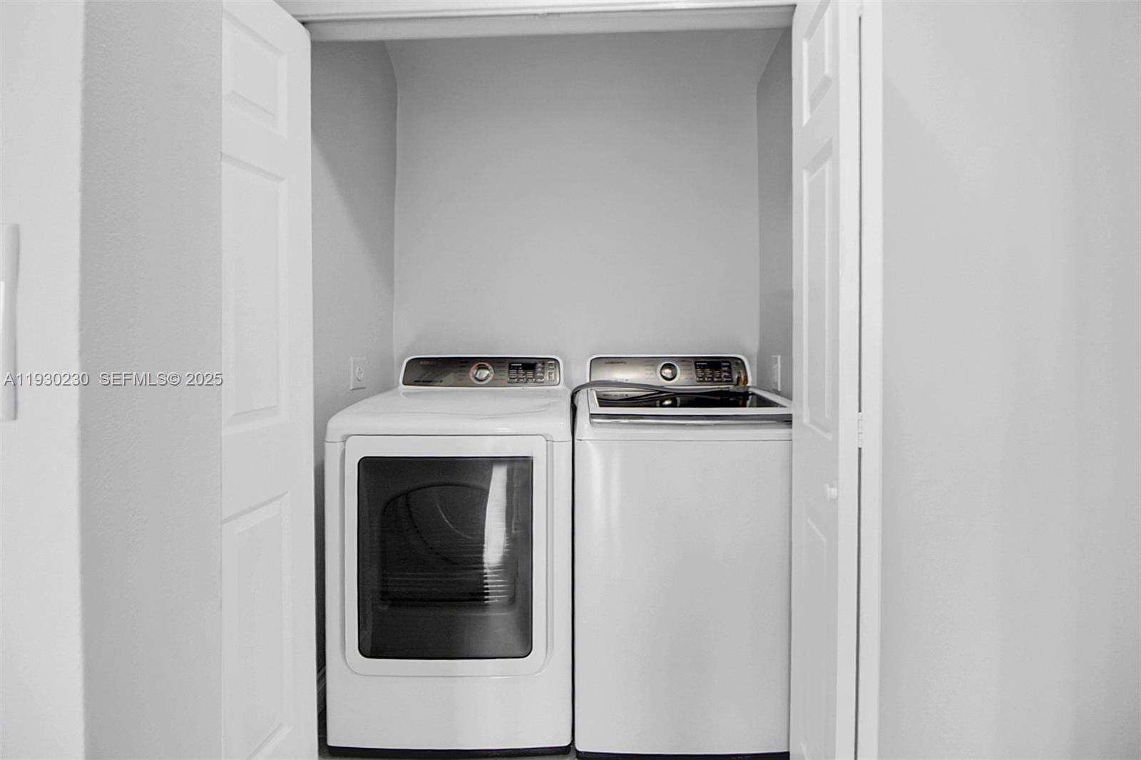 1022 Southwest 138th Place Miami, FL 33184 - Photo 15 of 39 a utility room with dryer and washer