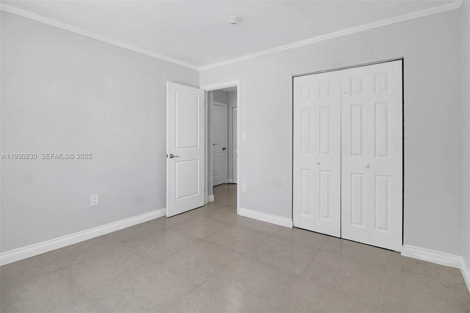 1022 Southwest 138th Place Miami, FL 33184 - Photo 17 of 39 a view of an empty room