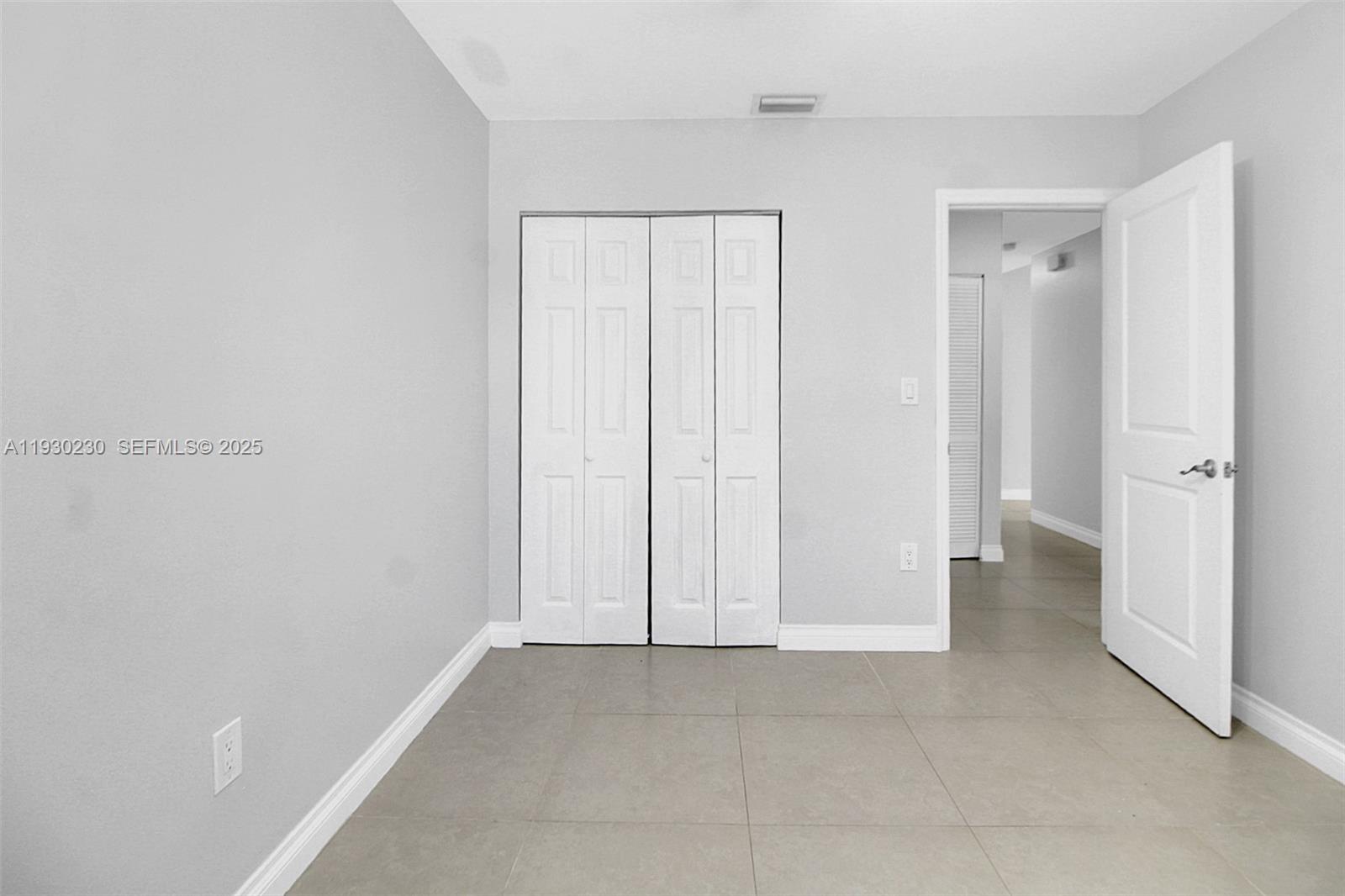 1022 Southwest 138th Place Miami, FL 33184 - Photo 19 of 39 a view of an empty room