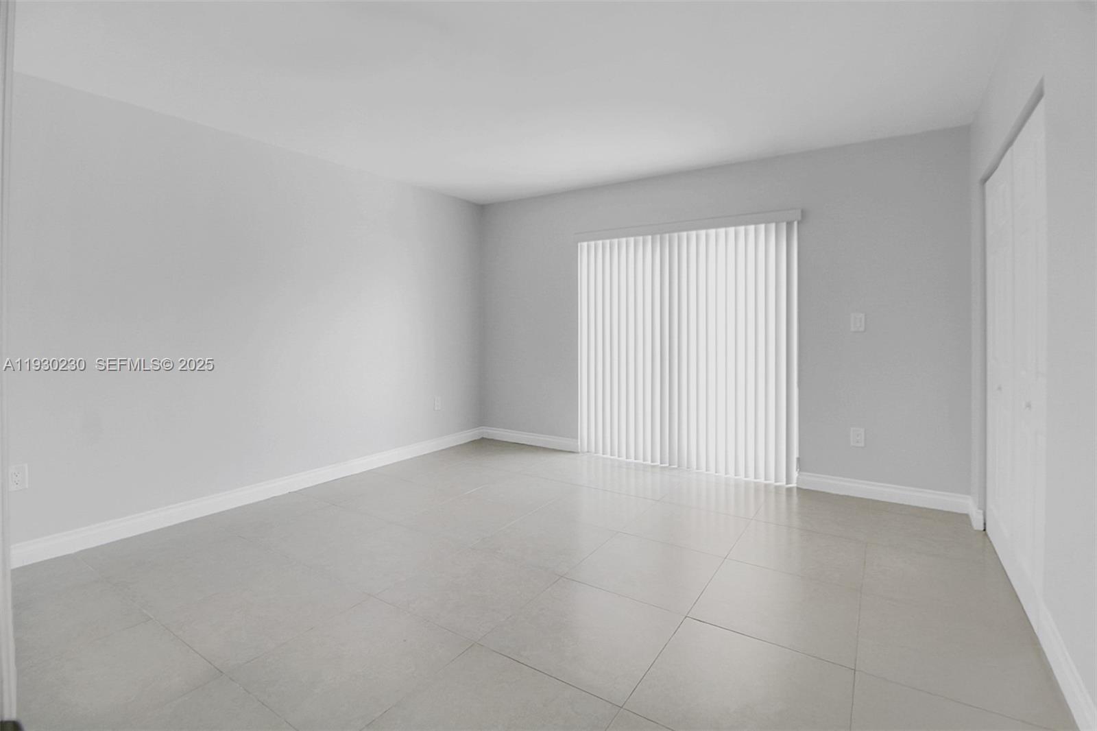 1022 Southwest 138th Place Miami, FL 33184 - Photo 23 of 39 wooden floor in an empty room