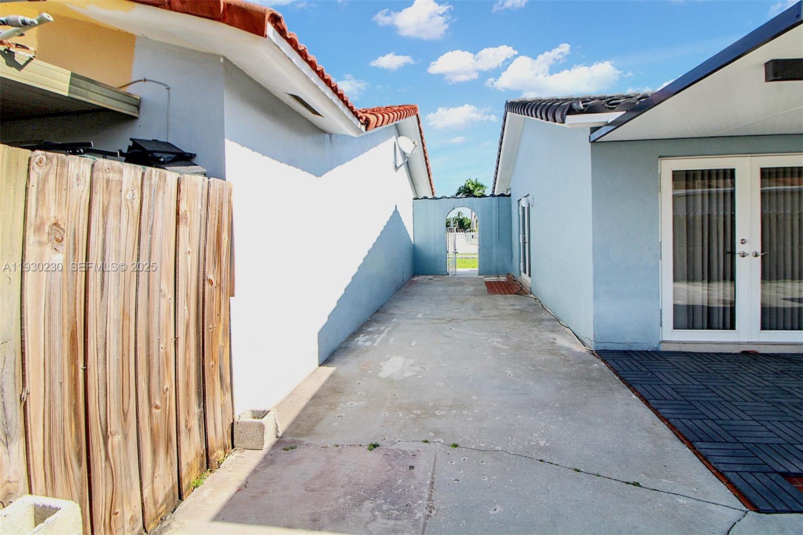 1022 Southwest 138th Place Miami, FL 33184 - Photo 34 of 39 a view of a house with a street