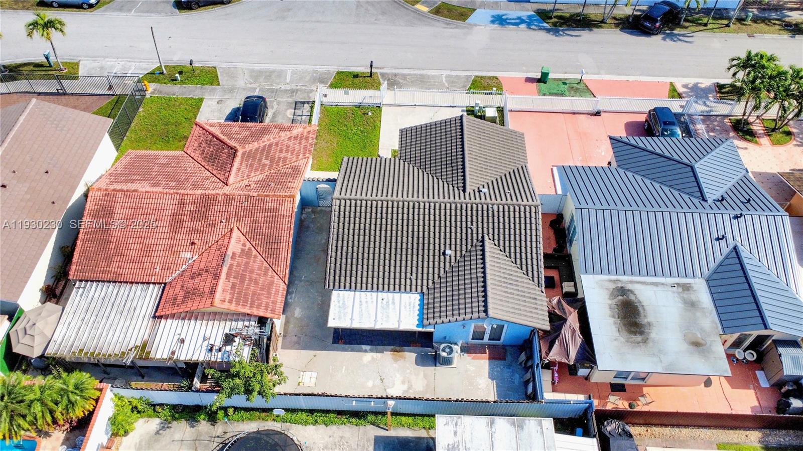1022 Southwest 138th Place Miami, FL 33184 - Photo 37 of 39 a view of outdoor kitchen with seating area