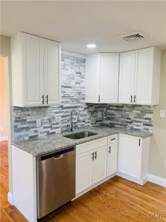 560 Knauss Road Nazareth, PA 18064 - Photo 9 of 25 a kitchen with stainless steel appliances granite countertop a sink stove and cabinets