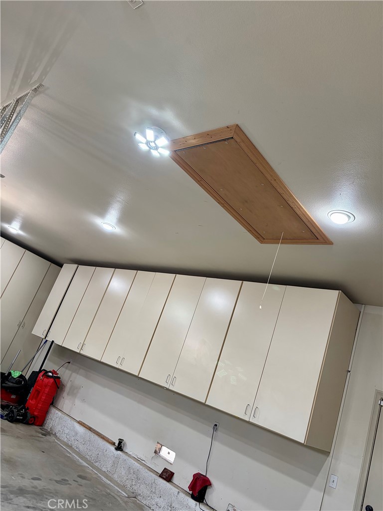 14445 Sunset Ridge Road Riverside, CA 92503 - Photo 33 of 45 Attic Storage Built in Ladder