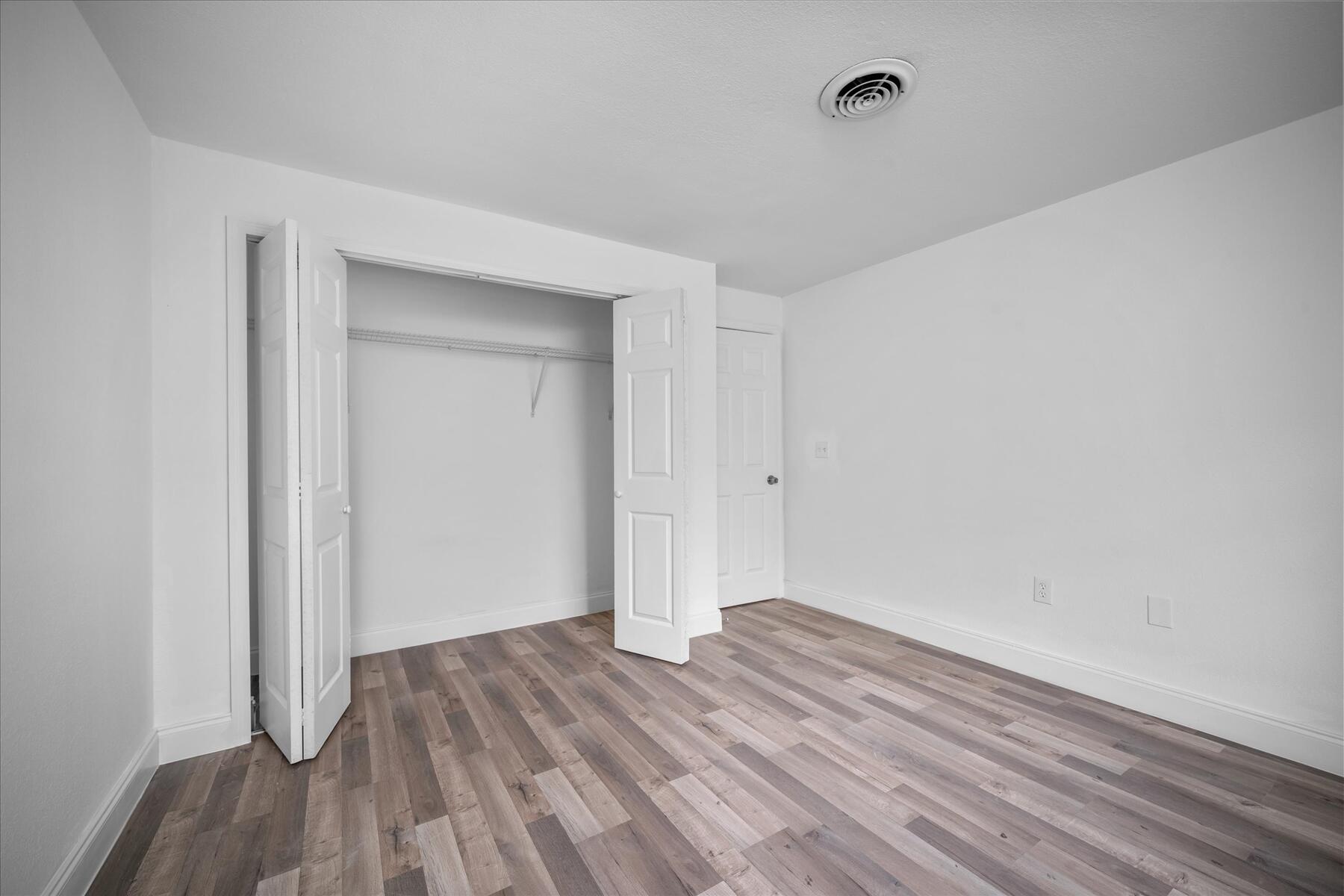 300 East Fee Avenue Melbourne, FL 32901 - Photo 18 of 27 a view of room with wooden floor