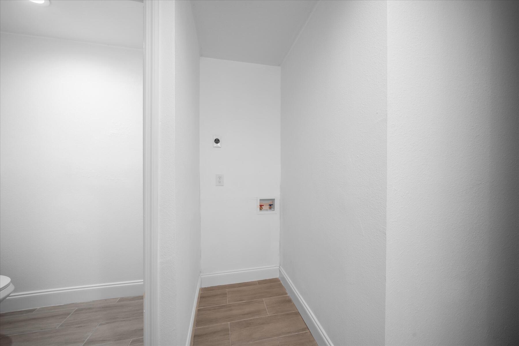 300 East Fee Avenue Melbourne, FL 32901 - Photo 21 of 27 a view of a hallway with wooden floor