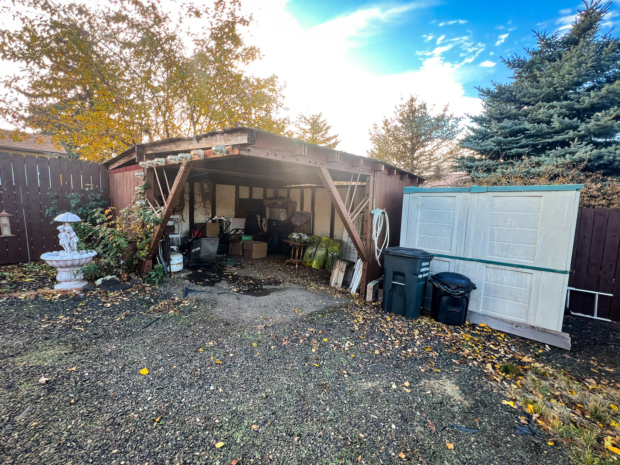 1225 East B Street Fossil, OR 97830 - Photo 26 of 33 a view of a backyard with furniture