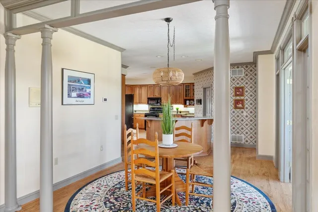 a kitchen with stainless steel appliances granite countertop a refrigerator stove top oven a sink and dishwasher