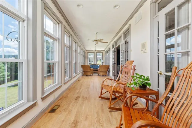 a spacious bathroom with a double vanity sink and a mirror