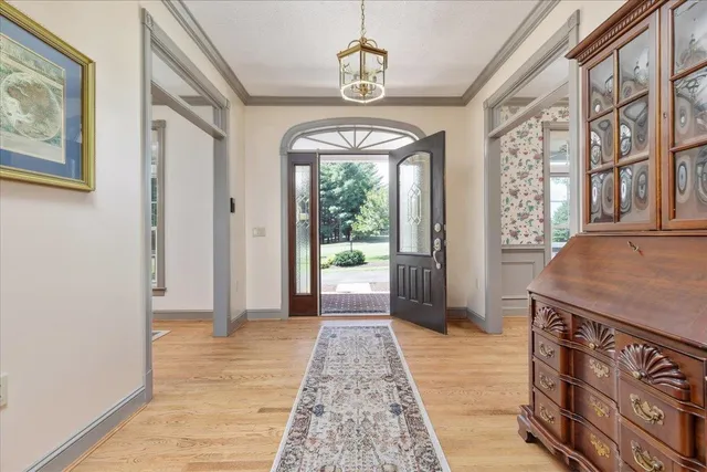 a view of livingroom with furniture wooden floor and windows