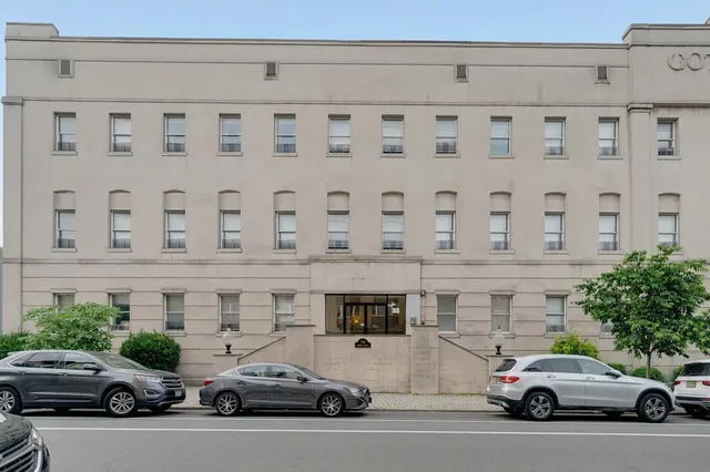 a car parked in front of a building