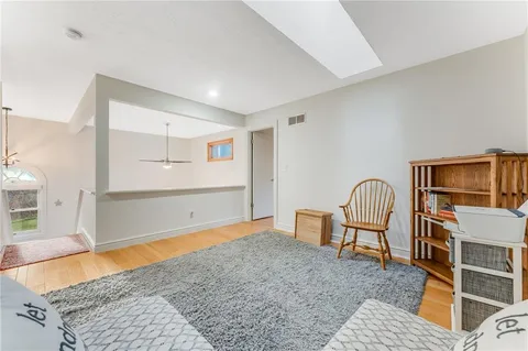 a bedroom with a bed and a table