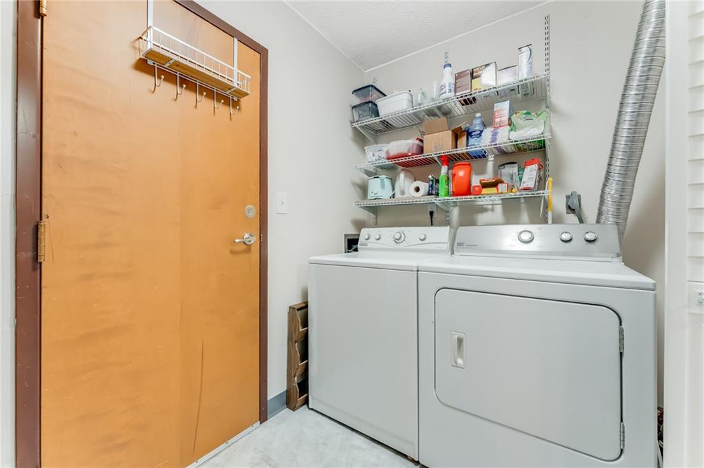412 Chandler Place Pittsburgh, PA 15212 - Photo 29 of 49 a utility room with dryer and washer