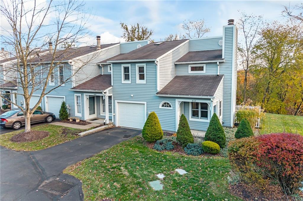 412 Chandler Place Pittsburgh, PA 15212 - Photo 49 of 49 a front view of a house with garden