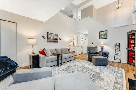 a living room with furniture and a couch