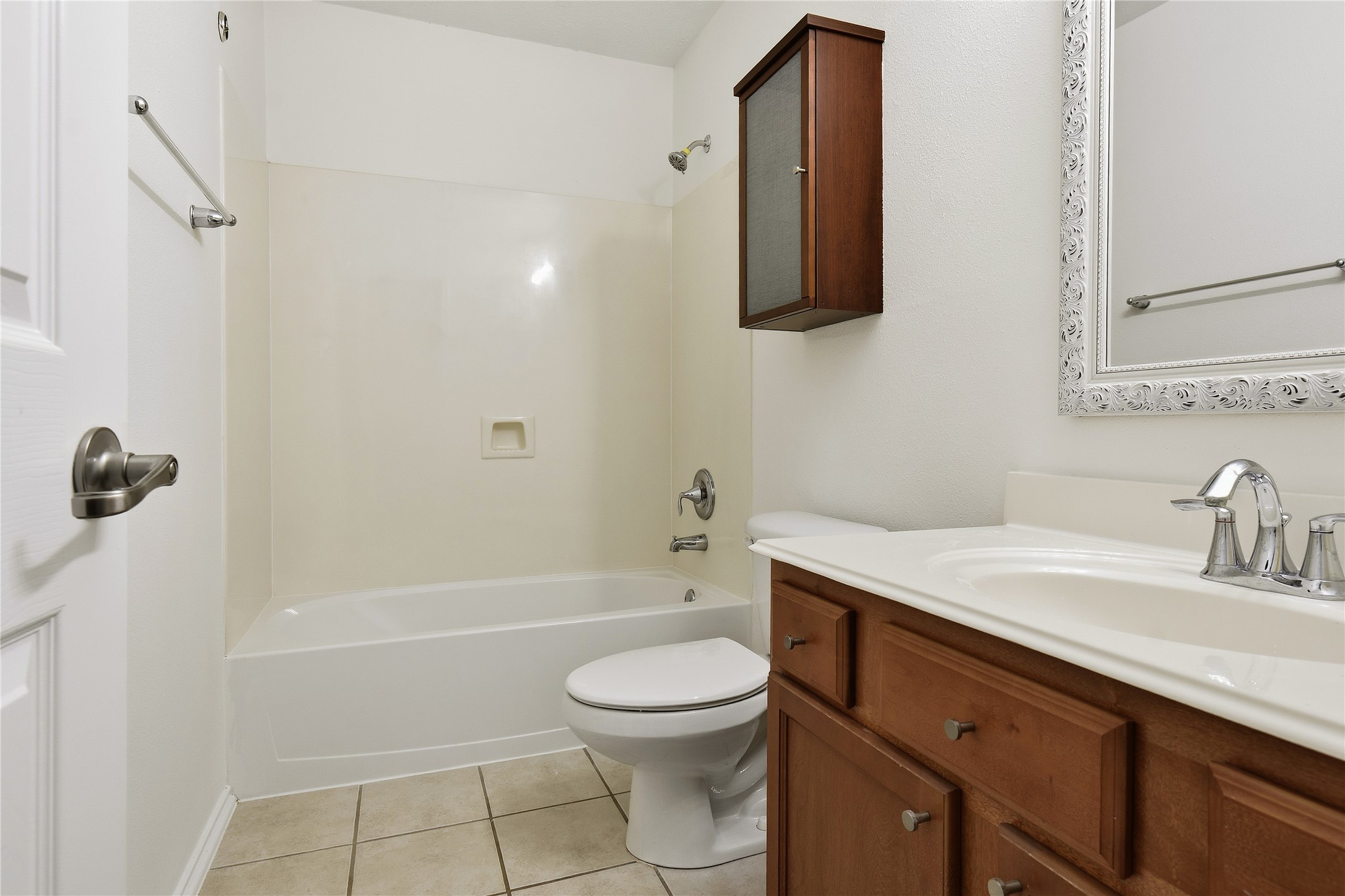5417 Summer Spring Lane Rosharon, TX 77583 - Photo 11 of 16 a bathroom with a sink a toilet and shower