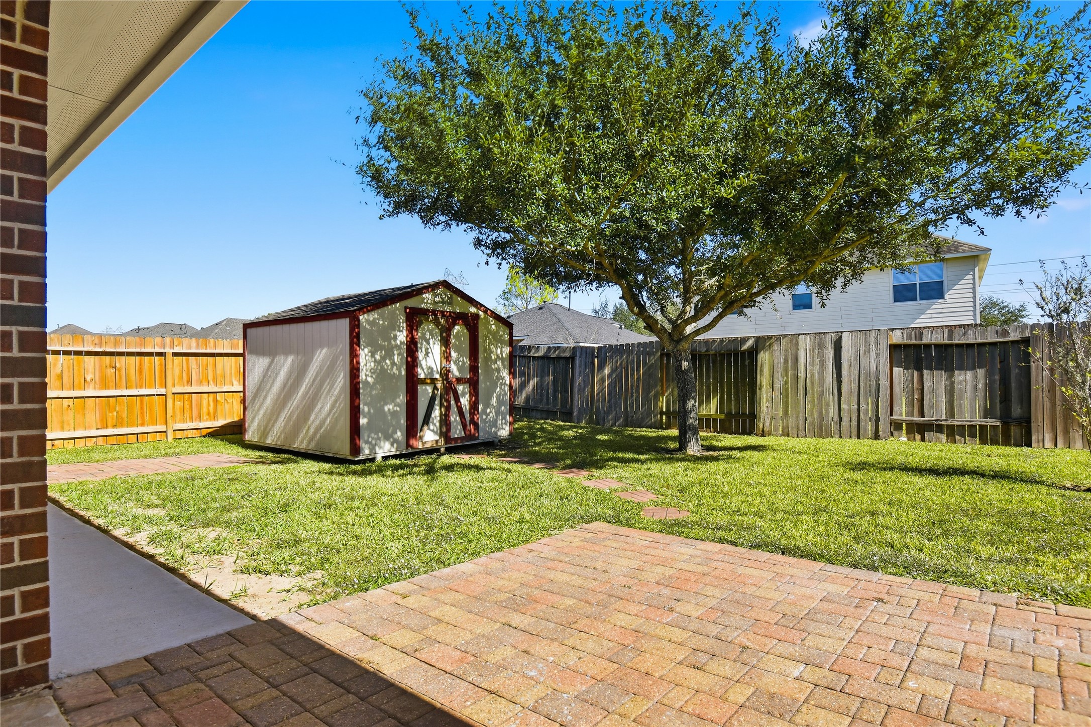 5417 Summer Spring Lane Rosharon, TX 77583 - Photo 14 of 16 a view of a house with a yard