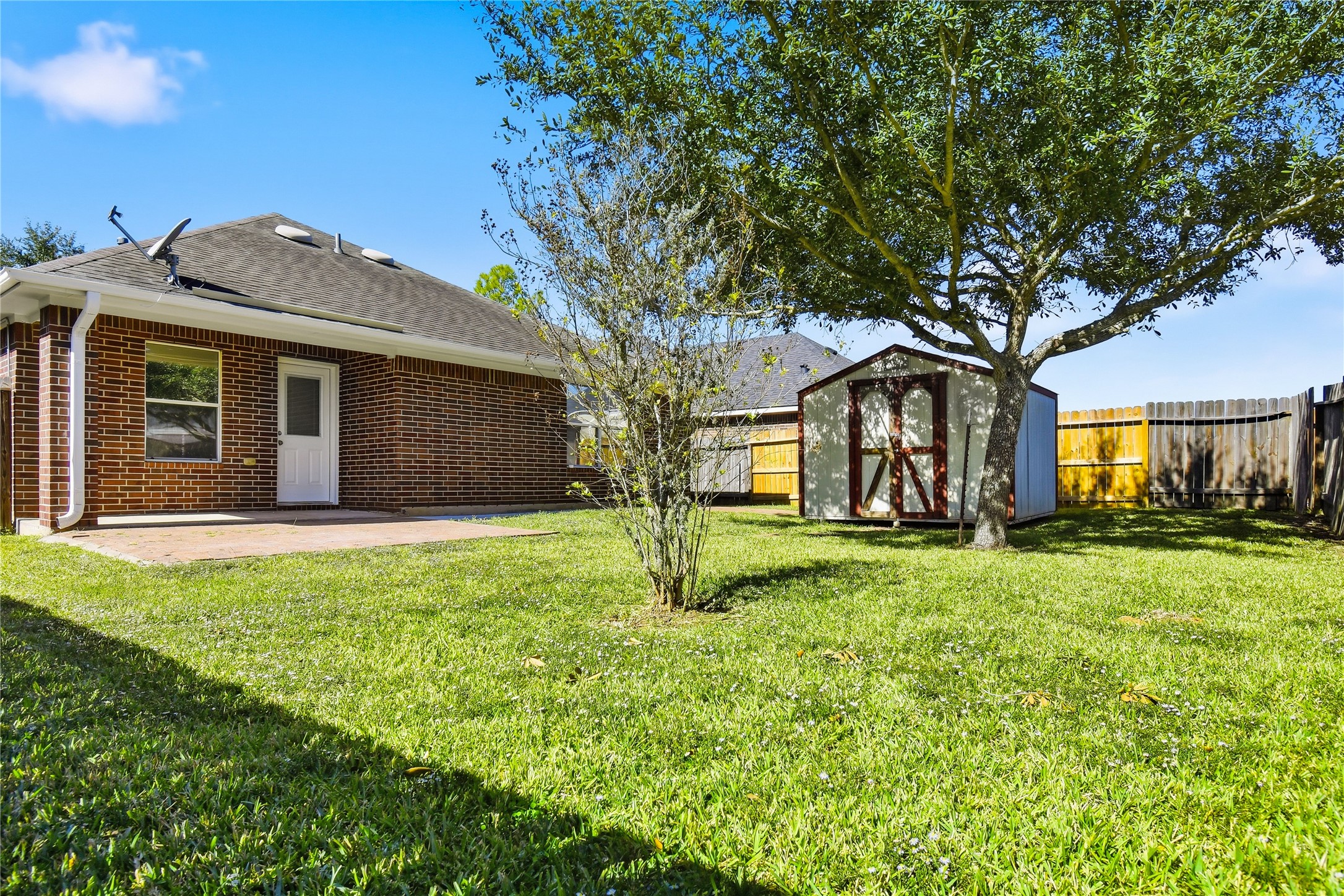 5417 Summer Spring Lane Rosharon, TX 77583 - Photo 15 of 16 a view of a house with yard and tree s