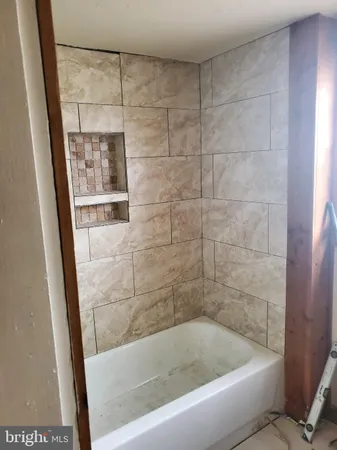 a bathroom with a bathtub