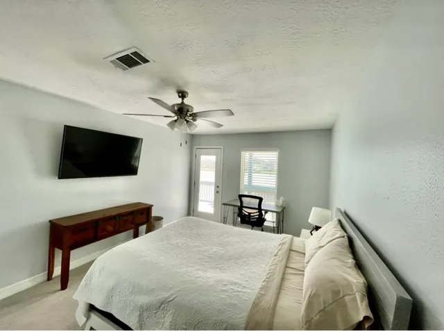 a bathroom with a sink double vanity and a mirror